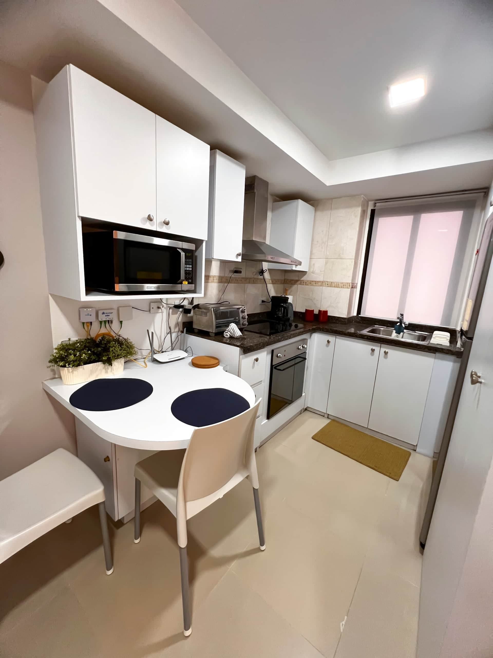 Cocina de Suite El Hatillo: apartamento compacto para dos